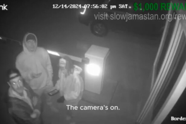 Father stands next to his children during burglary