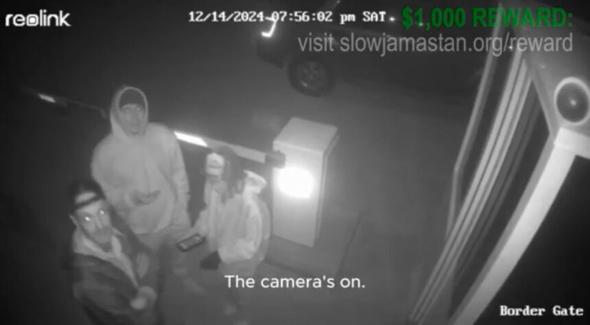 Father stands next to his children during burglary